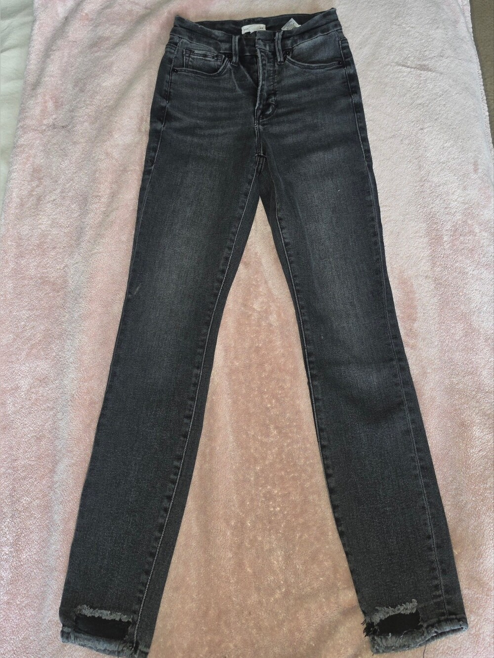 Good American Washed Black Skinny Jeans with Raw Hem